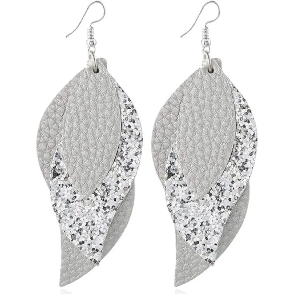 Feather shaped leather earrings with glitter